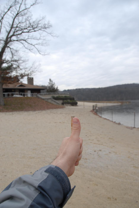 Thumbs across America, breach, building, pond, sand, trees, water