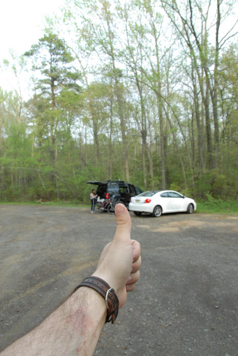 Thumbs across America, XTerra, cars, parking, trees, woods