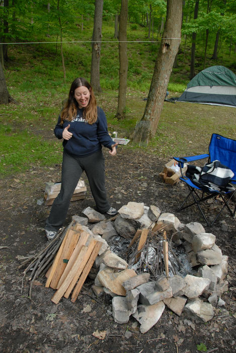 Jackie, fire ring, kindling, tent