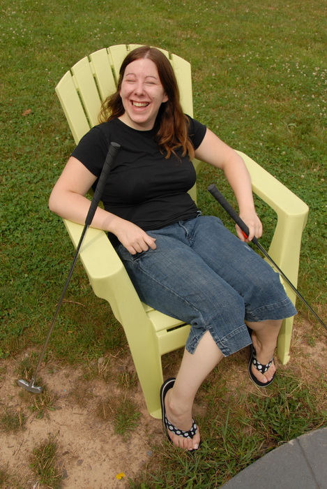Jackie, chair, golf club, grass, sitting, laughing