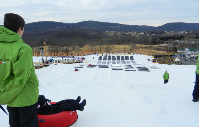 top of hill, tubing, snow, people, lanes